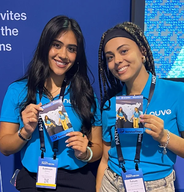 Guests holding branded mosaic photo cards.