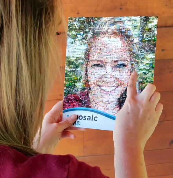 Guest holding a personal MosaicMe portrait.