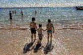 beaches family siblings children vacation ocean sand shadows distant distance full body travel love groups kids