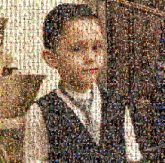 A Young Boy young youth boys children kids posing portrait smirking cute