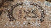 Aikawa Choritsu Takamine Elementary School Aikawa Choritsu Takamine Elementary School Text Font Footwear Circle Calligraphy Crowd Sport venue