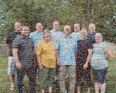 Family Family Social group Team Smile Shorts Plant Tree Sleeve Bermuda shorts People in nature Leisure Grass T-shirt